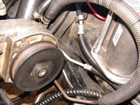 1973 Ford Ranchero - Close-up view of engine components including a pulley and various hoses.