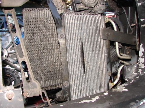 1973 Ford Ranchero - This image shows a close-up view of an engine oil cooler, likely part of a vehicle's cooling system.