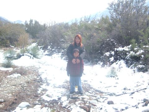 1988 Ford Bronco - A woman and child pose for a photo in a snow-covered, natural environment.