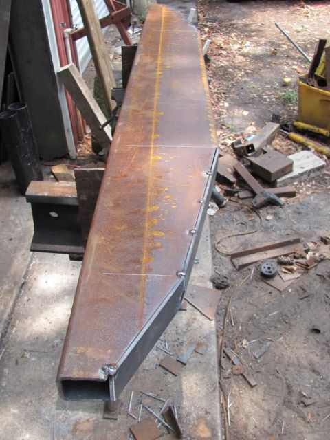 1982 Ford F-100 - Custom steel bumper section being fabricated, showing raw metal and welding work.
