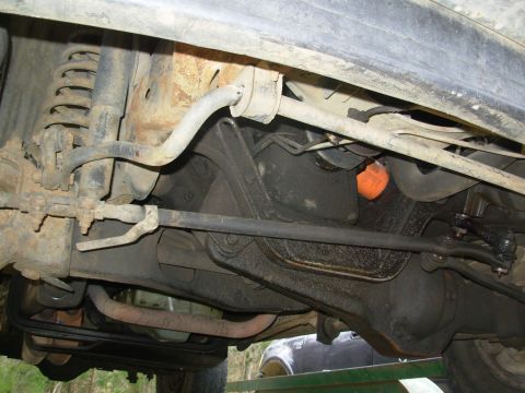 1983 Ford Bronco - Just your typical oily mess down here. Note the true dual exhaust dumping forward of the axle. What a pain...