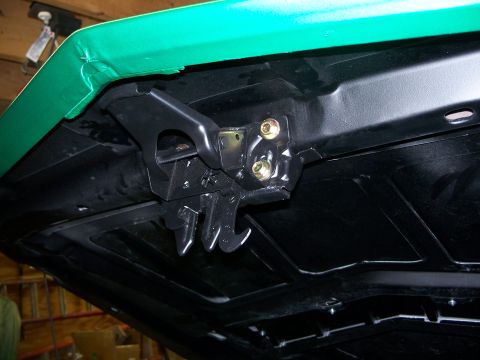 1971 Ford Ranchero - Close-up view of the hood latch assembly and its mounting points.