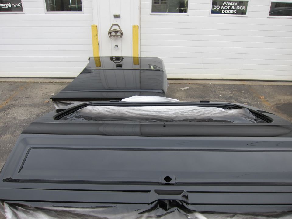 Black truck bed with tailgate and side panel