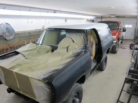 1987 Dodge 1500 - A Dodge Ramcharger is being prepped for paint in a garage, with another vehicle visible in the background.