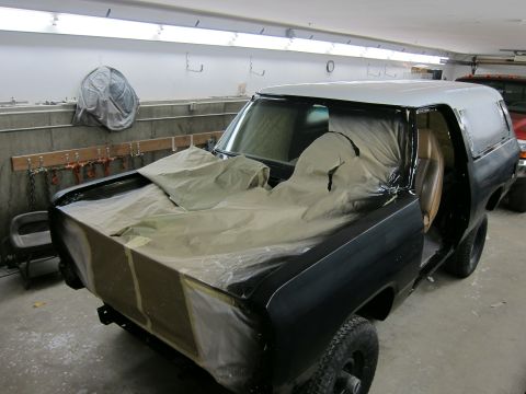 1987 Dodge 1500 - Bodywork in progress on a 1987 Dodge 1500 truck, with masking paper covering the front end.