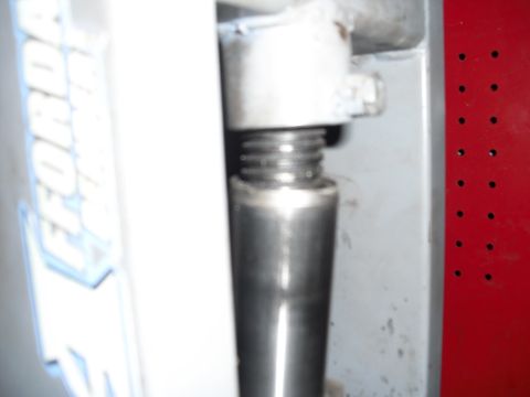 1986 Ford Bronco - Detail of a jack screw mechanism, likely from automotive repair equipment.