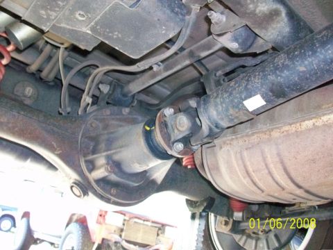 2000 Isuzu Vehicross - Undercarriage components including driveshaft and differential are visible in this photo.