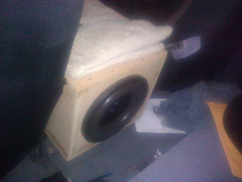 1992 Ford F-150 - A custom-built subwoofer enclosure is visible, likely installed in a vehicle's interior.