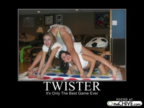 1994 Ford Bronco - Two women are playing the game Twister on a mat in a living room.