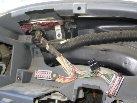 1983 Ford Bronco - The cluster wiring enters the cluster well just below the driver's door harness, which is immediately below the windshield.