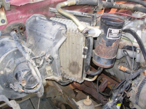 1983 Ford Bronco - This evaporator has the typical layer of dirt, though not as many leaves as I expected to find. The dark spot near the bottom is ash from t…