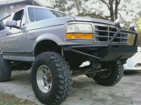 1995 Ford Bronco - Modified 1995 Ford Bronco shown with large tires and a heavy-duty front bumper.