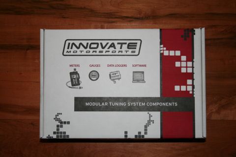 1996 Ford Bronco - This box displays components for a modular tuning system from Innovate Motorsports.
