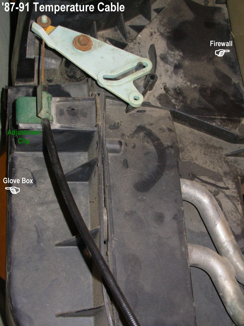HVAC temperature control cable and adjustment clip behind the dash