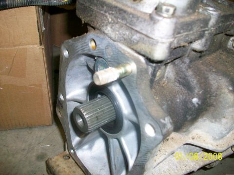 2000 Isuzu Vehicross - Close-up of a vehicle transmission component, showing a splined shaft and seal.