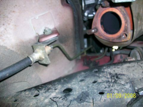 2000 Isuzu Vehicross - Close-up view of an exhaust pipe connection, with a date stamp visible in the lower right corner.