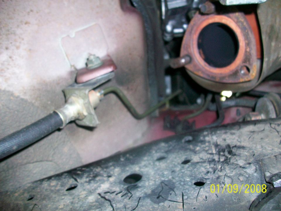 Exhaust pipe connection with visible date stamp '01/09/2008'