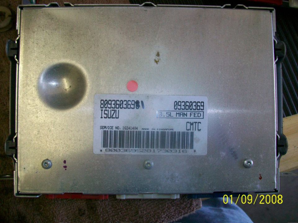 Isuzu ECM with part numbers 8093603698 and 09360369 visible