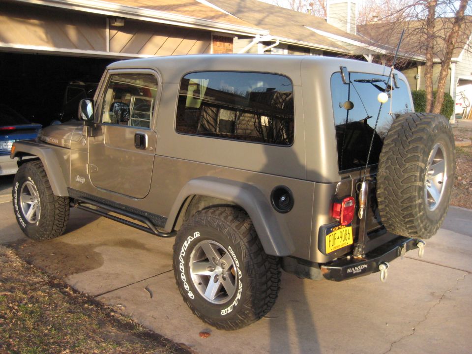 2005 Jeep Wrangler parked in driveway, rear quarter view. License plate FDF-9066