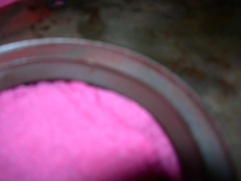 1984 Ford Bronco - A close-up shot shows a pink fuzzy mat inside a vehicle's wheel well, with the "SUPERMOTORS" logo visible.