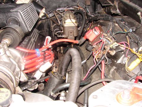 1973 Ford Ranchero - Close-up of an engine bay, "COBRA" valve covers and various engine components.