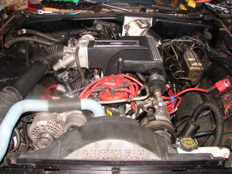 1973 Ford Ranchero - A close-up view of a vehicle's engine bay, showing various components and wiring.