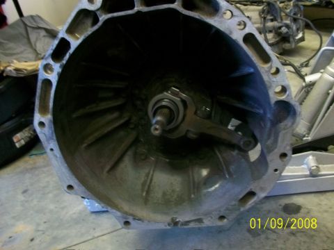 2000 Isuzu Vehicross - Close-up view of a transmission bell housing, showing the internal clutch fork mechanism.