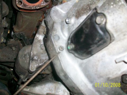2000 Isuzu Vehicross - Close-up view of engine parts with a visible date stamp.