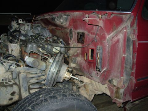 1983 Ford Bronco - Everything is disconnected in preparation to lift the body, EXCEPT the t-case shifter bezel screws. They have to be picked clean & then blo…