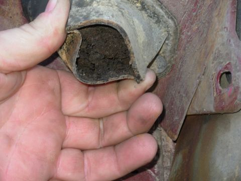 1983 Ford Bronco - Cowl drains need to be cleaned periodically because rotting leaves, dirt, insects, & fungus build up in them. This shows one with the fende…