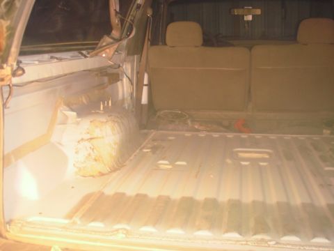 1993 Ford Bronco - Interior view of the cargo area of a 1993 Ford Bronco, showing the floor and rear seats.