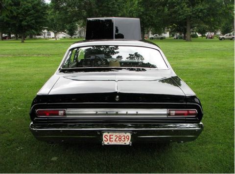 1966 Mercury Comet - This 1966 Mercury Comet is shown from the rear, a prominent hood scoop and a custom license plate.