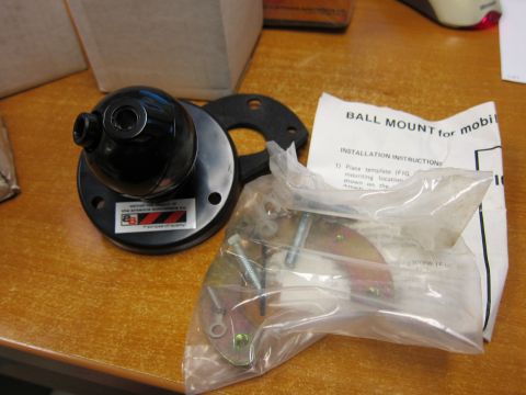 1991 Ford LTD Crown Victoria - A black ball mount for a mobile antenna is shown with its installation instructions and hardware.