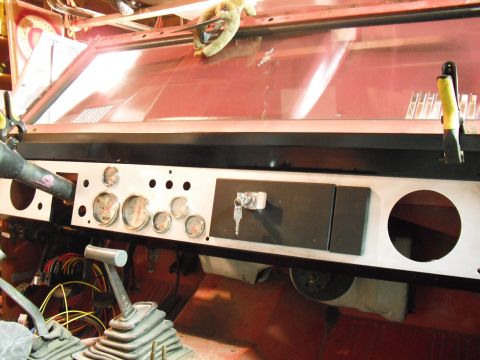 1968 Ford Bronco - The interior of a 1968 Ford Bronco shows a custom dashboard with various gauges and wiring.