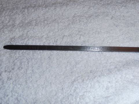 1990 Ford Bronco - An oil dipstick with part number E8TE-6750-AC is shown against a white, textured background.