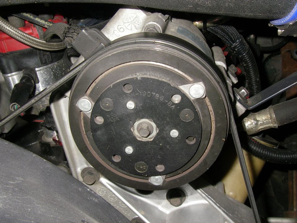 Air conditioning compressor clutch with part number 137H-190786-BA visible
