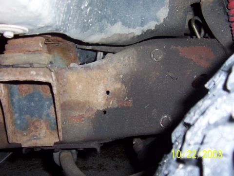 1987 Ford Bronco - front part of frame behind bumper on left side