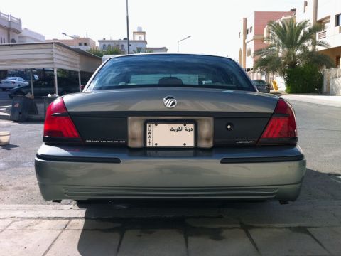 2001 Mercury Grand Marquis - Rear view of a 2001 Mercury Grand Marquis, showing the taillights and license plate.