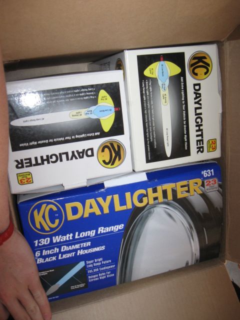 1995 Ford F-150 - Several boxes of KC Daylighter lights are shown inside a cardboard box.