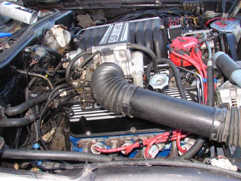 1973 Ford Ranchero - The engine bay shows a Ford 5.0 HO engine with various aftermarket parts installed.