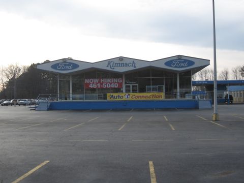 1968 Shelby GT500 - Kimnach Ford dealership exterior with a parking lot and several cars visible.