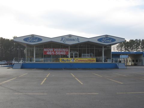 1968 Shelby GT500 - Exterior view of the Kimnach Ford dealership building on an overcast day.