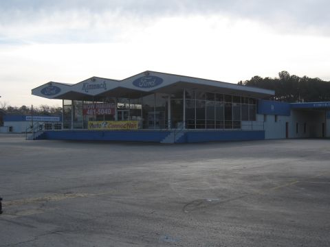 1968 Shelby GT500 - Exterior view of a Kimnach Ford dealership, showing its distinctive architecture and signage.
