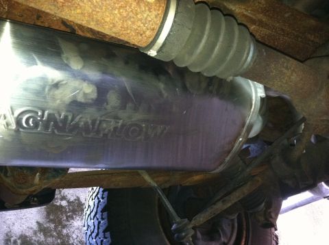 1996 Ford Bronco - Close-up of a Magnaflow exhaust muffler, showing the brand name stamped into the metal.