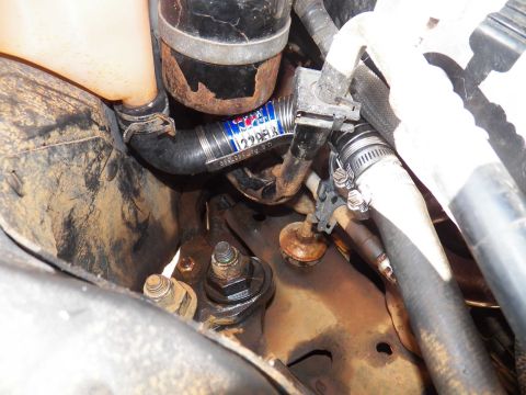 1993 Ford Crown Victoria - Using a unicoil on a hose to get around the a/c line.