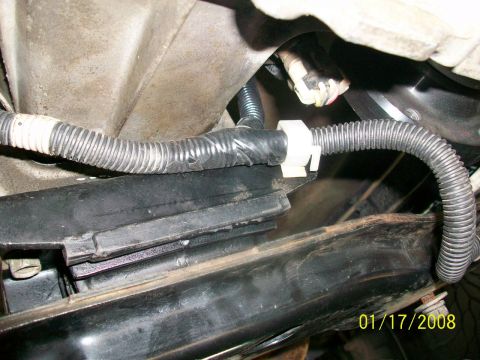 2000 Isuzu Vehicross - Vehicle wiring harness and frame components visible in close-up. Date stamp indicates 2008.