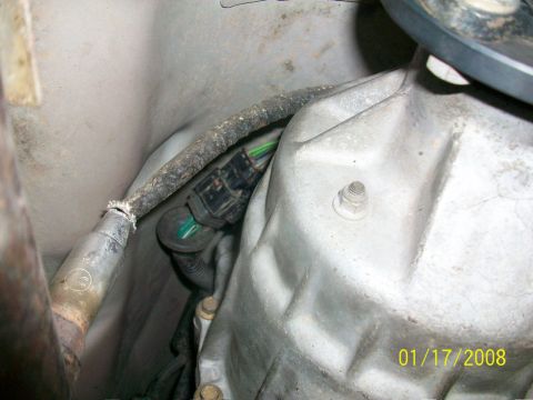 2000 Isuzu Vehicross - Close-up view of an engine wiring harness connected to a transmission casing, with a date stamp of 01/17/2008.