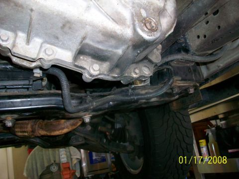 2000 Isuzu Vehicross - Underside view of a vehicle's drivetrain and suspension components.