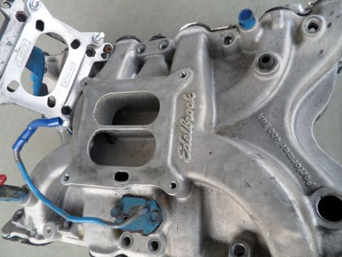 1973 Ford Ranchero - Close-up of an Edelbrock Performer 400 EGR intake manifold, showing its distinctive casting and attached blue wiring.