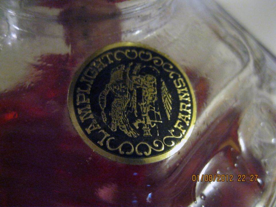 Gold and black circular label reading 'AMPLIGHT FARMS' with a graphic in the center. Date stamp '01/08/2012 22:27' and 'SUPERMOTORS' logo visible